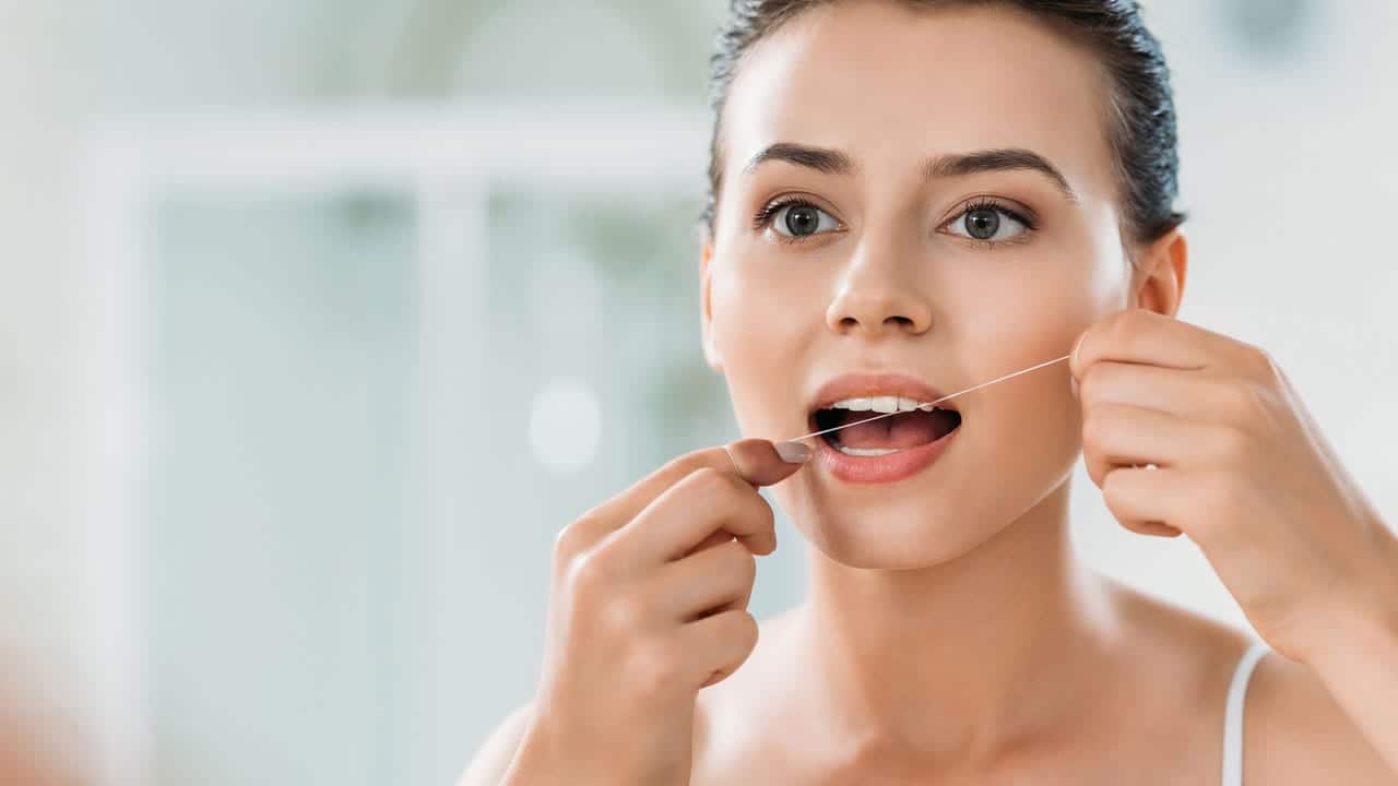 The Link Between Poor Flossing and Gum Disease Grays